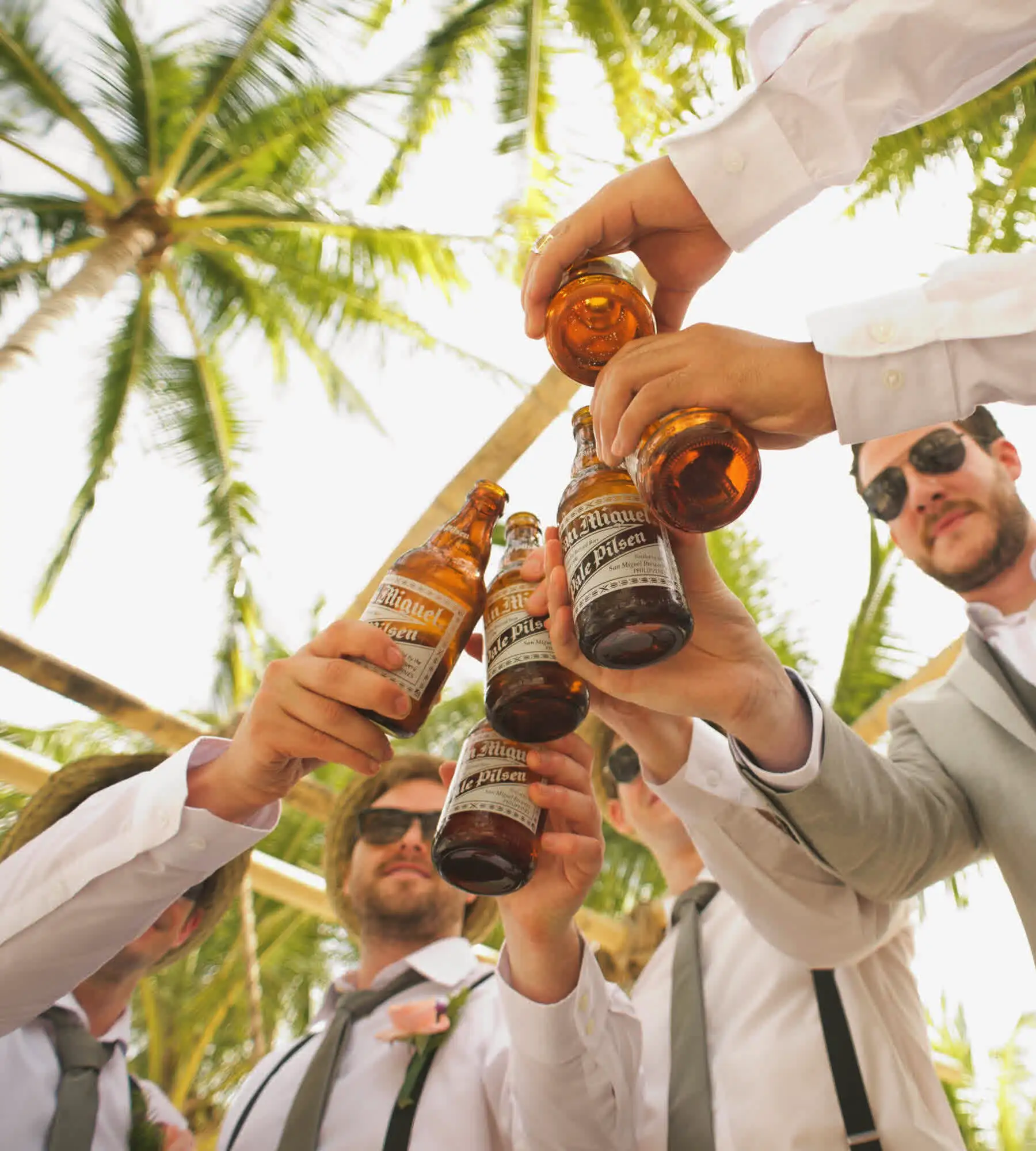 Grooms' party having drinks